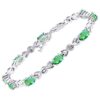 Close-up of Emerald & Diamond XOXO Tennis Bracelet featuring a Hugs & Kisses design with alternating emerald and diamond links, set in polished sterling silver, adjustable for wrist sizes 7" to 8". 