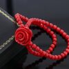 Pop of Color to Your Outfit with Gem Stone King's 7-Inch Purple Simulated Coral Bead Rose