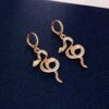 Gold Hoop Butterfly Earrings with Charm