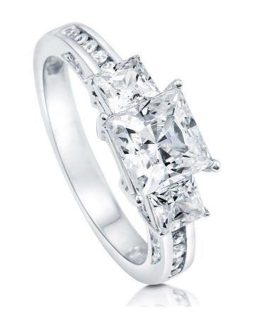 Love Story with the Rhodium-Plated Sterling Silver Princess Cut 3-Stone CZ Engagement Ring - A Timeless Symbol of Love and Commitment