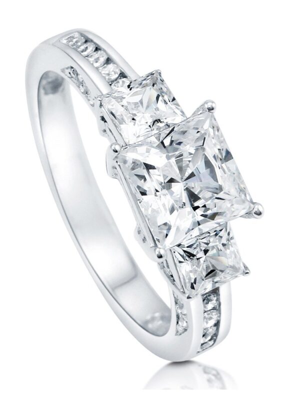 Love Story with the Rhodium-Plated Sterling Silver Princess Cut 3-Stone CZ Engagement Ring - A Timeless Symbol of Love and Commitment