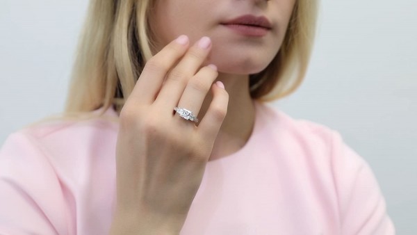 Love Story with the Rhodium-Plated Sterling Silver Princess Cut 3-Stone CZ Engagement Ring - A Timeless Symbol of Love and Commitment